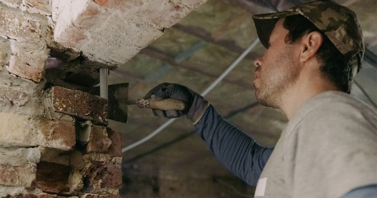 Brick repair in Brooklyn NY showing masonry restoration and mortar joint repair on a residential building